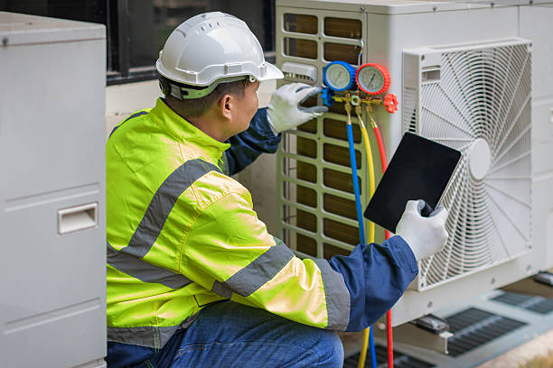 Professional Hvac technician working in Tioga, ND